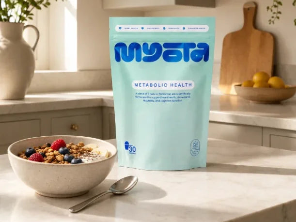 A myota scoop and tin on a kitchen counter