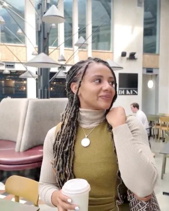 Kelsey with a coffee